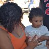 Braxton gets his face painted by FFA volunteers.