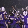 Tigers celebrate after beating Hanford for the West Yosemite League title.