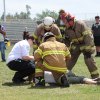 Checking out a victim for signs of life.