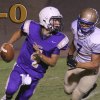 Cort Groathouse scored two second half touchdowns to rally his Tigers past visiting Clovis Friday night. 
