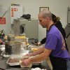 Lemoore Police Commander Steve Rossi helps out in the kitchen Sunday morning.