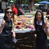 Dairy Princesses Alexis Mello and Emily Rose show off their prize winning slice Saturday.