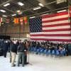 A gigantic flag provides inspiration in the NAS Lemoore hangar.