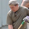 Lions President Jeff Garcia busy with a shovel.