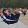 Clearing the bar in the high jump at the Kiwanis Meet