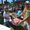 Kristine Lee and Pat Mundy show off a colorful slice.