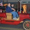 Fire Chief John Gibson revs up the old fire truck.