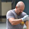 Ray Madrigal flexes his muscles with the shovel.