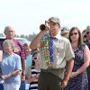 Eagle Scout Roman Benitez plays taps.