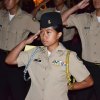 An NJROTC cadet salutes.