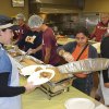 The Leos dish out dinner Thursday afternoon.