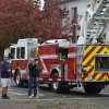 Using the Lemoore Fire Department truck and ladder to raise the tree.