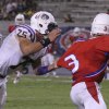 Zack Frazier menaces the Buchanan quarterback.