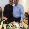 Jesus Garcia visits with the dessert girl at a restaurant in Curitiba.