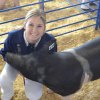 Kelsie Cotta and her hog, Stella.