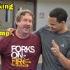 West Hills Coach Kent Olson and NCAA champ Chris Pendleton share a laugh at Monday's wrestling camp in the Golden Eagle Arena.