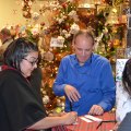 John Miller, of Ramblin' Rose, chats up some potential customers Saturday night.