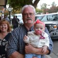 David Morrell and grandchild enjoy a pleasant evening at the Holiday Stroll.