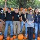 FFA students gather round the pumpkins at annual Pumpkin Patch.