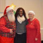 Santa and Ms. Claus with their elf