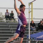 Tyson Pereira clears 14-2 in the pole vault.