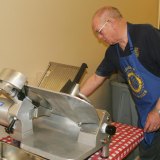 John Bloyd prepares the tri-tip.