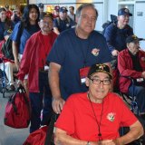 Former Hanford Mayor David Ayres escorts his father-in-law Francis Rynda to the airplane.