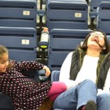 Gloria Gornick and granddaughter Isabel enjoy the game.