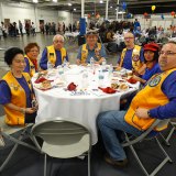 Members of the Lemoore Lions Club enjoy the dinner.