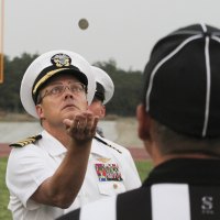 Capt. Monte Ashliman with the pre-game coin flip.