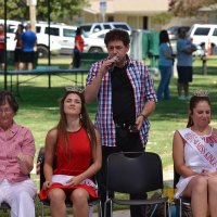 The hypnotist, Allen Sands, puts audience members under.