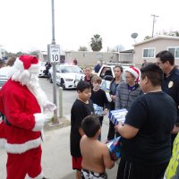 Santa joins the Lemoore Police Department as they deliver gifts as part of the department's annual "Presents on Patrol."