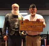 The Tachi Palace Hotel & Casino presented a $7,096 check 


to American Legion representatives William Overby and 
Randy McCord.