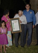 Harry Miya and wife Nancy were honored with the Chamber's Agriculturist of the Year Award. Here Miya is presented a proclamation from Assemblyman Rudy Salas.