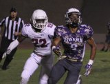 Lemoore's Allen Perryman keeps his eye on the ball.