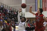 Arthur Madison goes for two of his 10 points against WYL champion Hanford Thursday night.