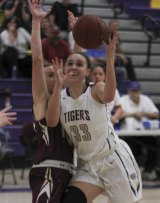 Lemoore's Bobbie Henry scored 17 points in the Tigers' 52-39 Division II playoff win over visiting Sierra High School.