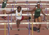 Kings Christian High's Moesha Davidson won the 100-meter hurdles at the Kiwanis Track Invitational Friday night.
