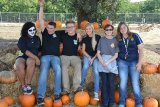 FFA students gather round the pumpkins at annual Pumpkin Patch.
