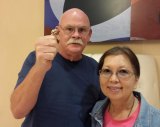Don and Faye Ely with Jawanza William's 1991 class ring, lost for 20 years and recently returned.