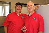 Dr. Tim Ellsworth (right) and Farm of the Future Director Clint Cowden.