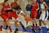 Erista Battle goes for the ball against Porterville College.