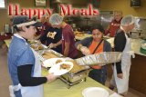 Local volunteers feed 400 at Senior Citizens Center, prepare 800 takeout meals 