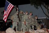 One of the highlights of the first annual Veterans Day Parade was this American Legion float depicting the raising of the flag at Iwo Jima.