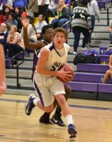 Spencer Stringer eyes the basket in easy win over Mt. Whitney