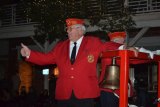 Marine Corps vet Corky McFarland waves to the crowd.