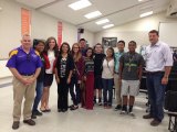 Lt. Cmdr. John Wolstenholme (far left) and several students from Lemoore High's NJROTC unit met with Congressman David Valadao at a service academy night Thursday at Hanford West High School.