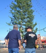 A pair of Lemoore Volunteer firemen admire the department's work.