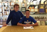Peter Castro with Great-Grandmother Francisca Rocha, as he signs with San Jose State to play water polo.