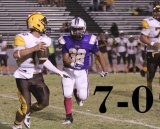 Lemoore's Tim Johnson (32) eyes a quarterback sack.